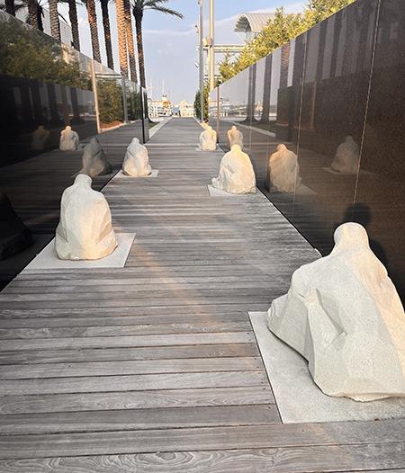 These hand-sculpted, kneeling, and hunched figures represent the slaves of the Middle Passage brought to Charleston. They sit here at the walkway to the International African American Museum in Charleston, South Carolina, located on the historic site of Gadsden’s Wharf.