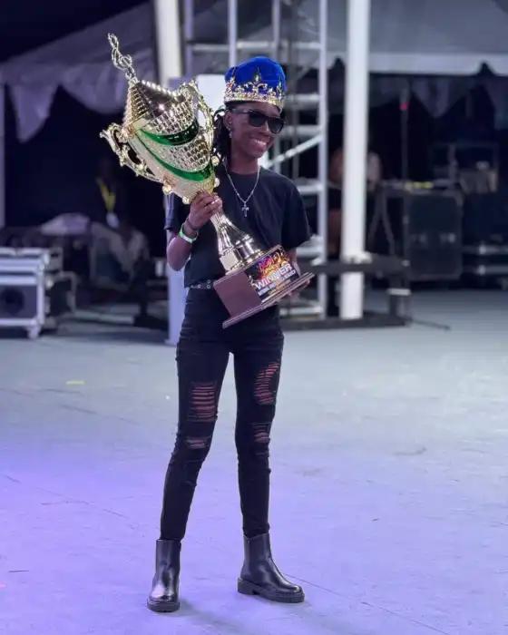Kisha Kay holds the Groovy Soca Monarch trophy after her historic victory.