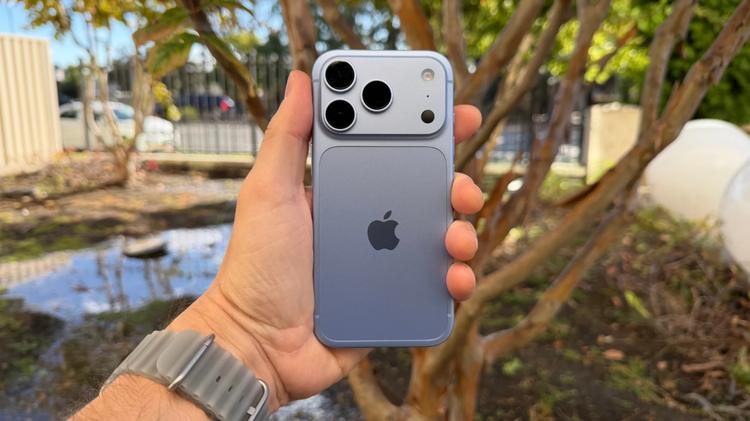 the iphone 18 pro in a man's hand