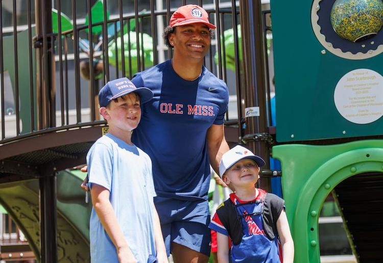 Ole Miss football players pay special visit to Children’s of Mississippi patients
