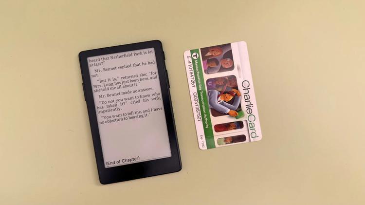 The Xteink X4 Pro next to a metro card.