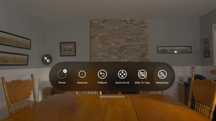 The view of a room from a pair of Apple Vision Pro goggles. In the middle of the screen is a pop up menu with various commands including one that reads 