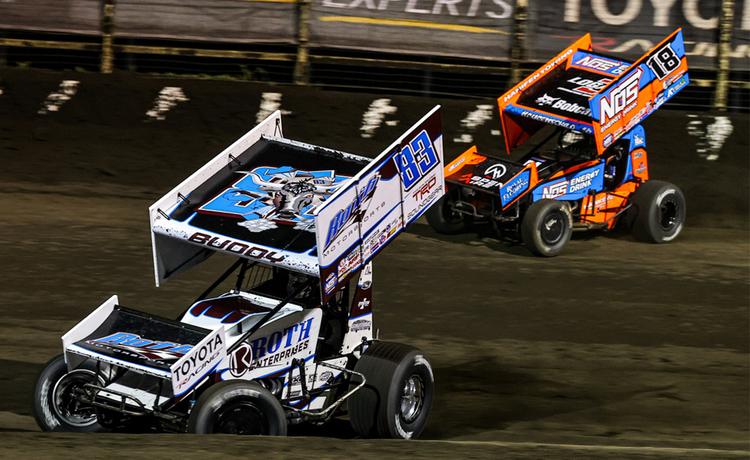 Buddy Kofoid races ahead of Sheldon Haudenschild