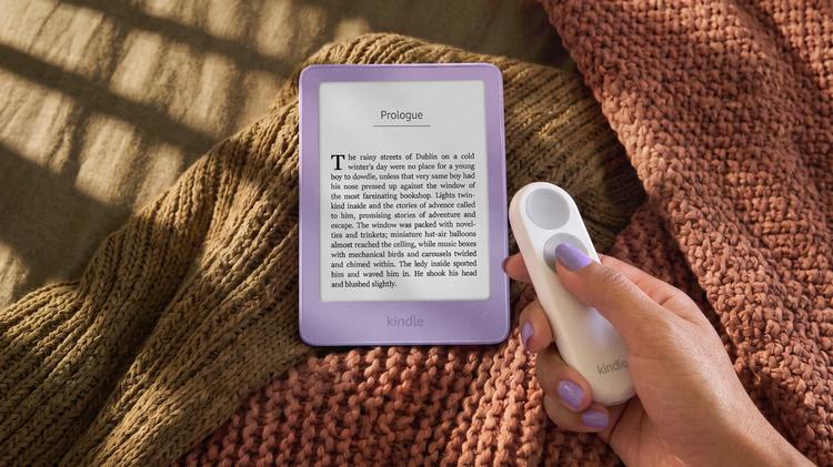 woman using kindle click with new ube-colored kindle