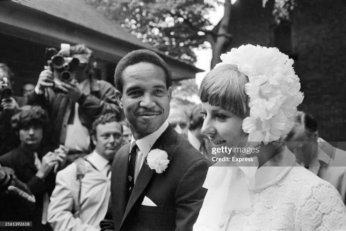 FLASHBACK - West Indies Cricketer Garry Sobers with his wife Prudence (née Kirby) on their wedding day outside Basford Registry Office, Nottingham, September 12th 1969.