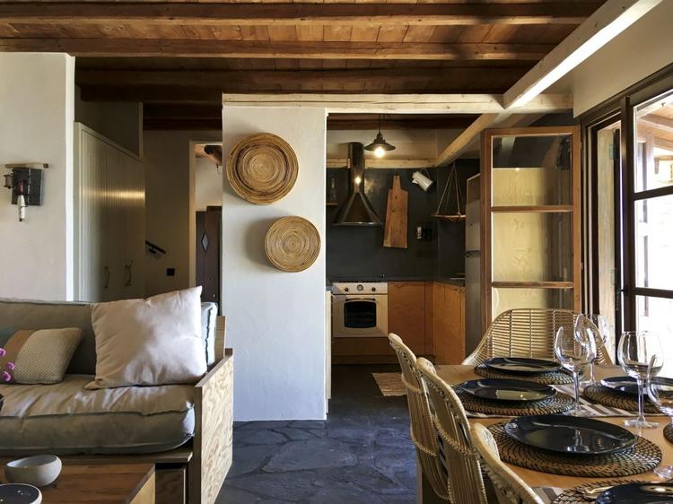Pelion Villas with Pool - View of the internal dining area, the living room and the kitchen in Villas Iris in Pelion.