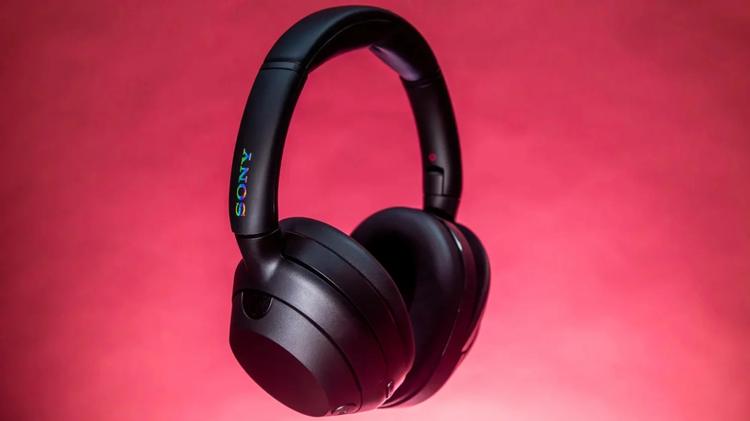sony ult wear headphones on pink background