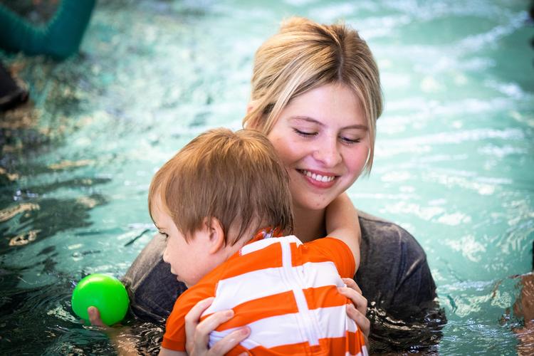 Mississippi State, Southern Miss partner to give swimming lessons to children with special needs