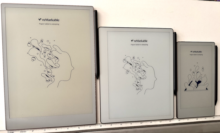 Three Remarkable tablets, one tall, one short, one medium