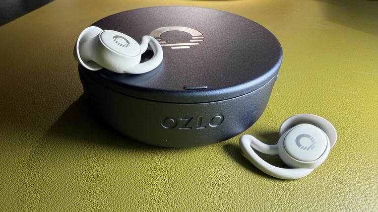 ozlo sleepearbuds 2 sitting on top of and next to case