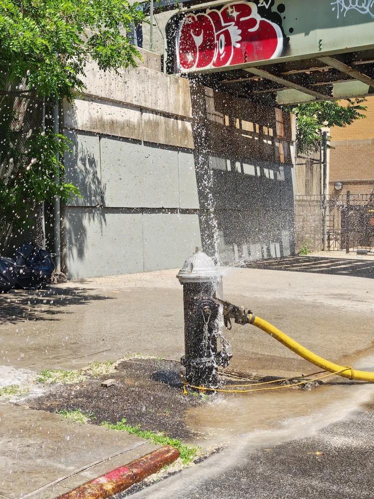 fire hydrant leaking on new york city street